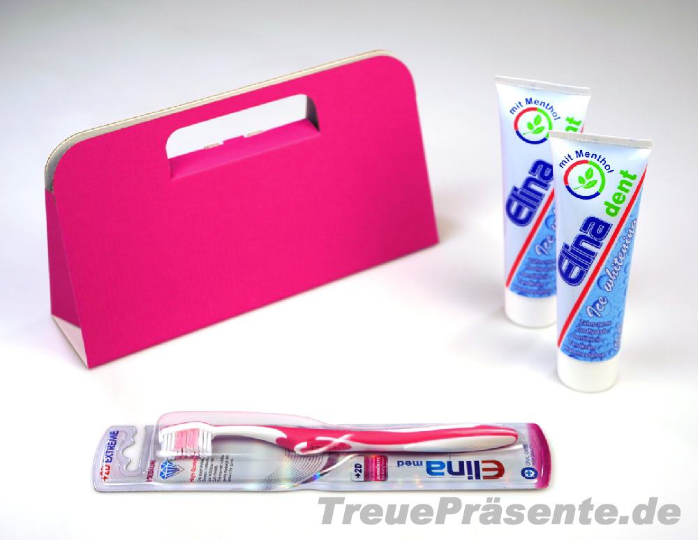 Zahnbürste mit Zahnpasta in Geschenkverpackung